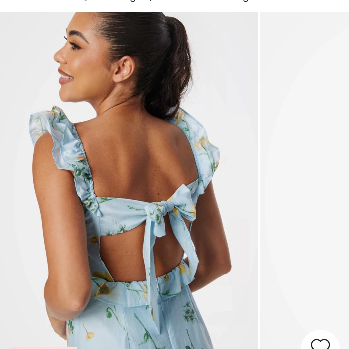 Ljusblå långklänning med volang och knyt