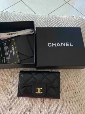 Key Pouch Plånbok - Helt ny, tillbehören följer inte med endast plånboken.