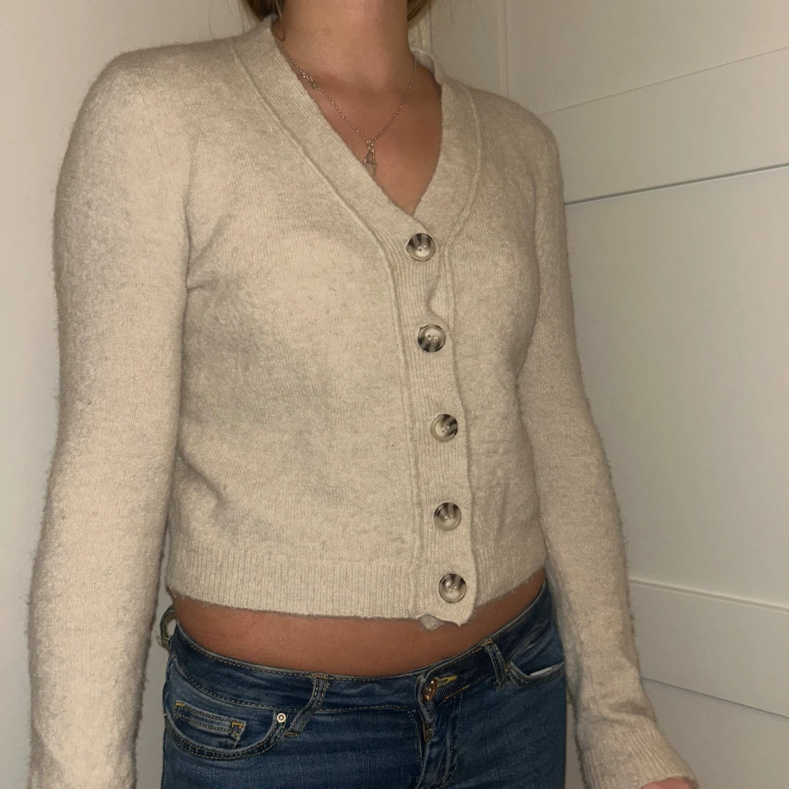 Beige kofta från Zara med knappar