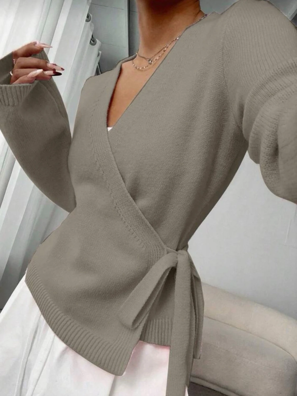 Beige omlottkofta med knytband