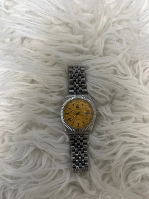 Polo Klocka  - Den är i nytt skick med ett nytt batteri 