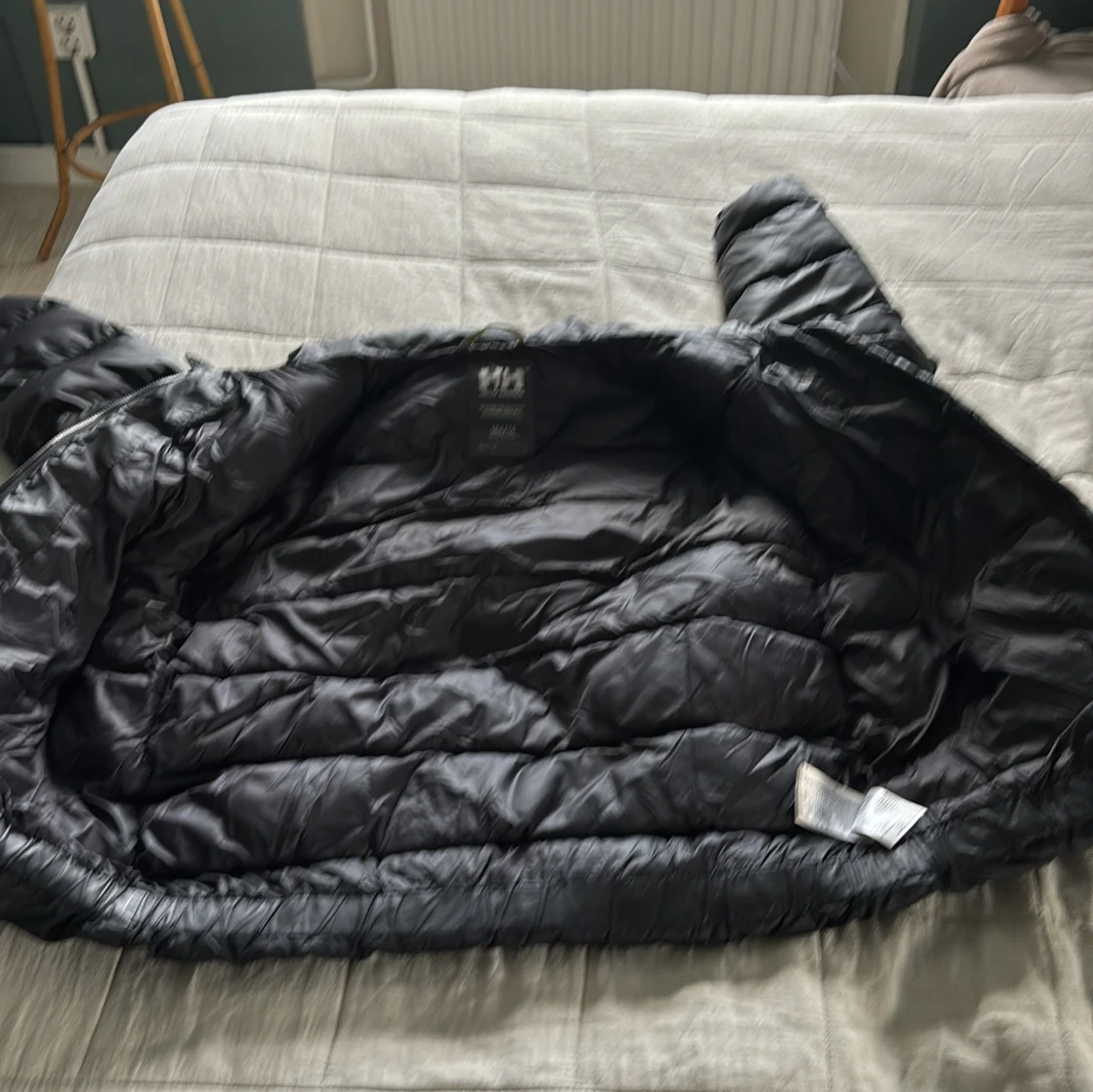 Svart pufferjacka Helly Hansen 164/14