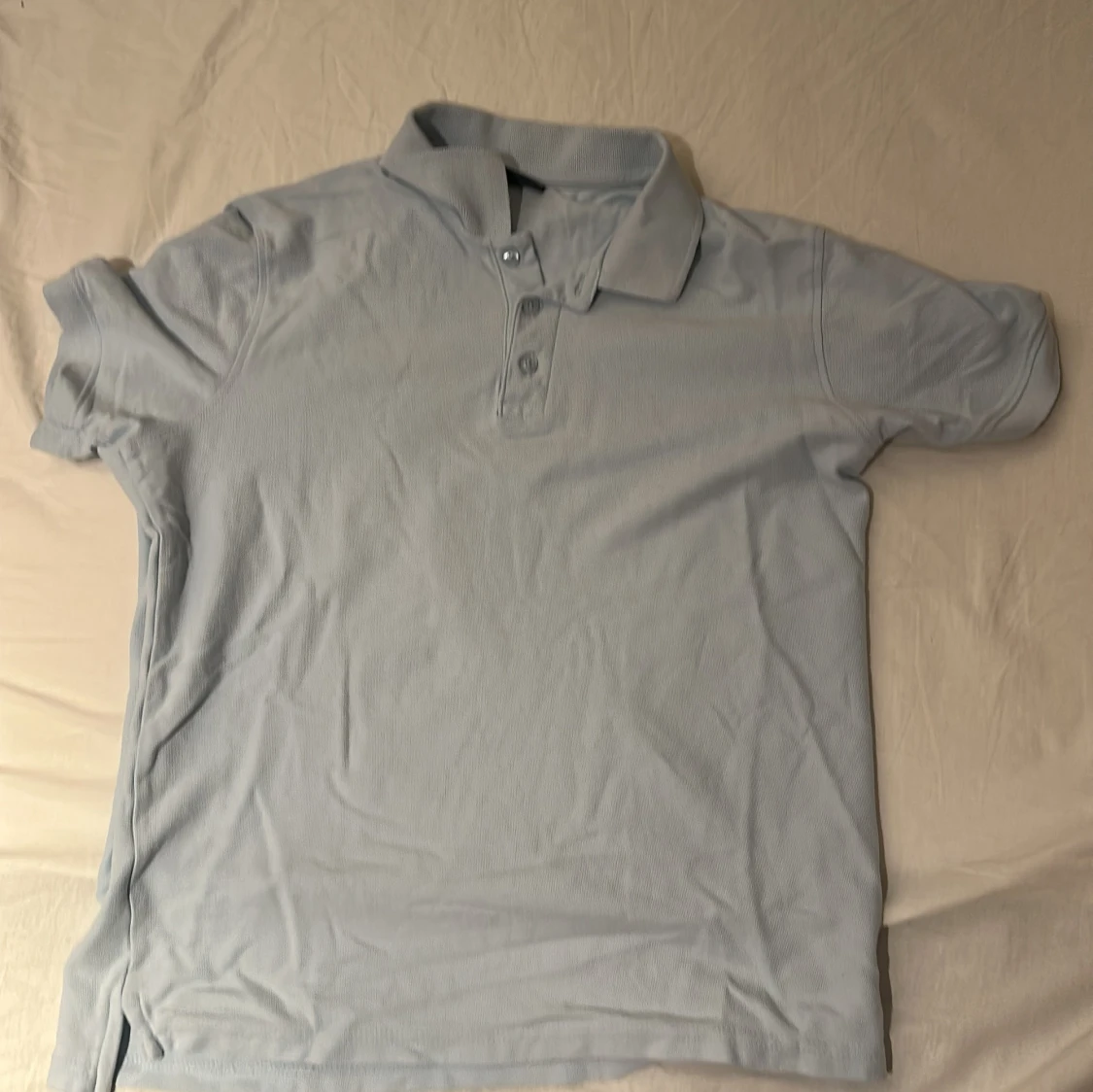 Ljusblå pikétröja från RUN, stl M - 1