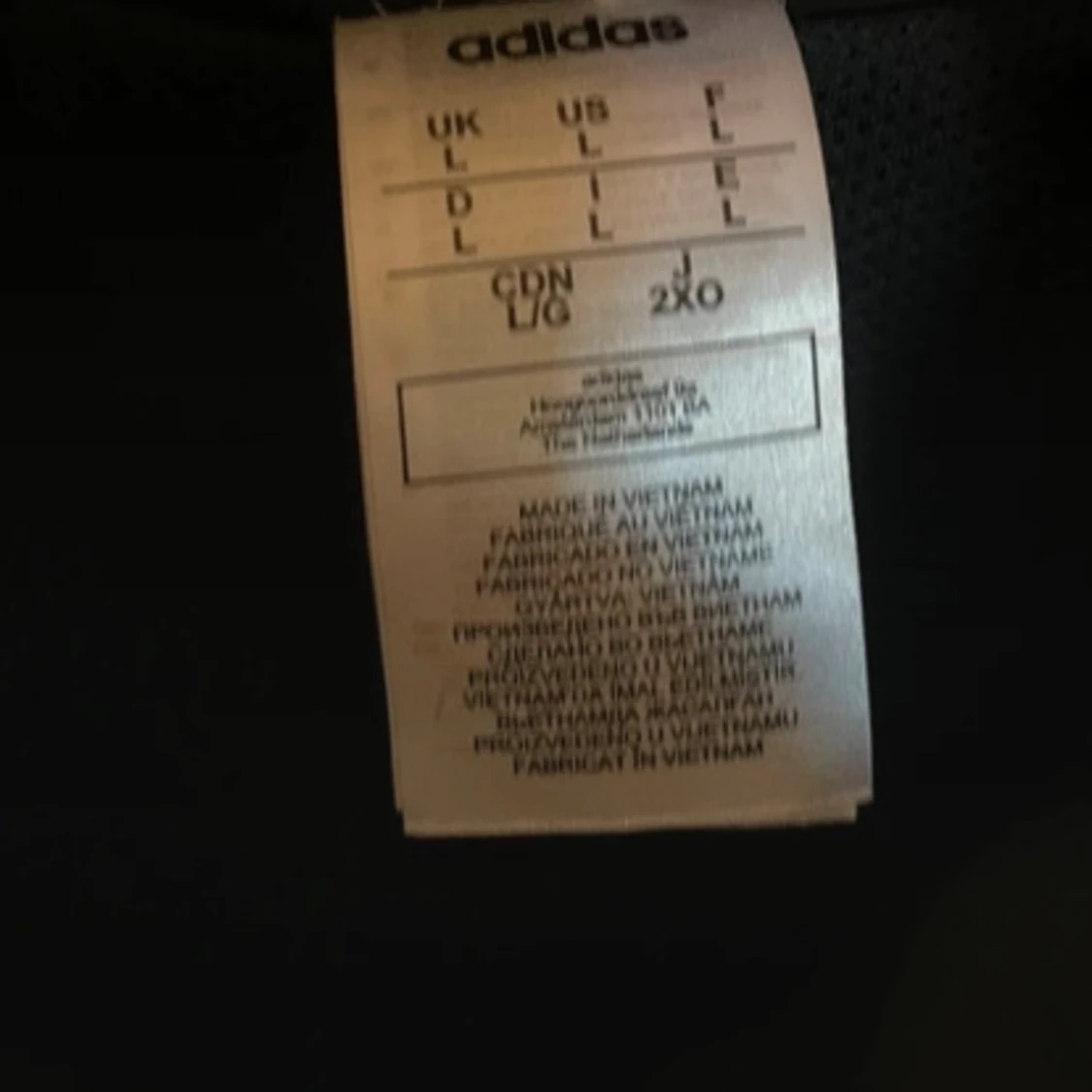 Svart vindjacka från Adidas i L - 2