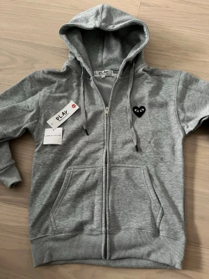 Zipkofta grå - Perfekt skick helt oavänd