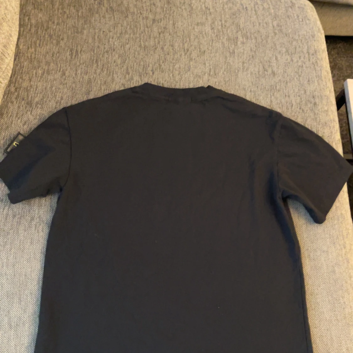 Svart Stone Island t-shirt med patch - 1