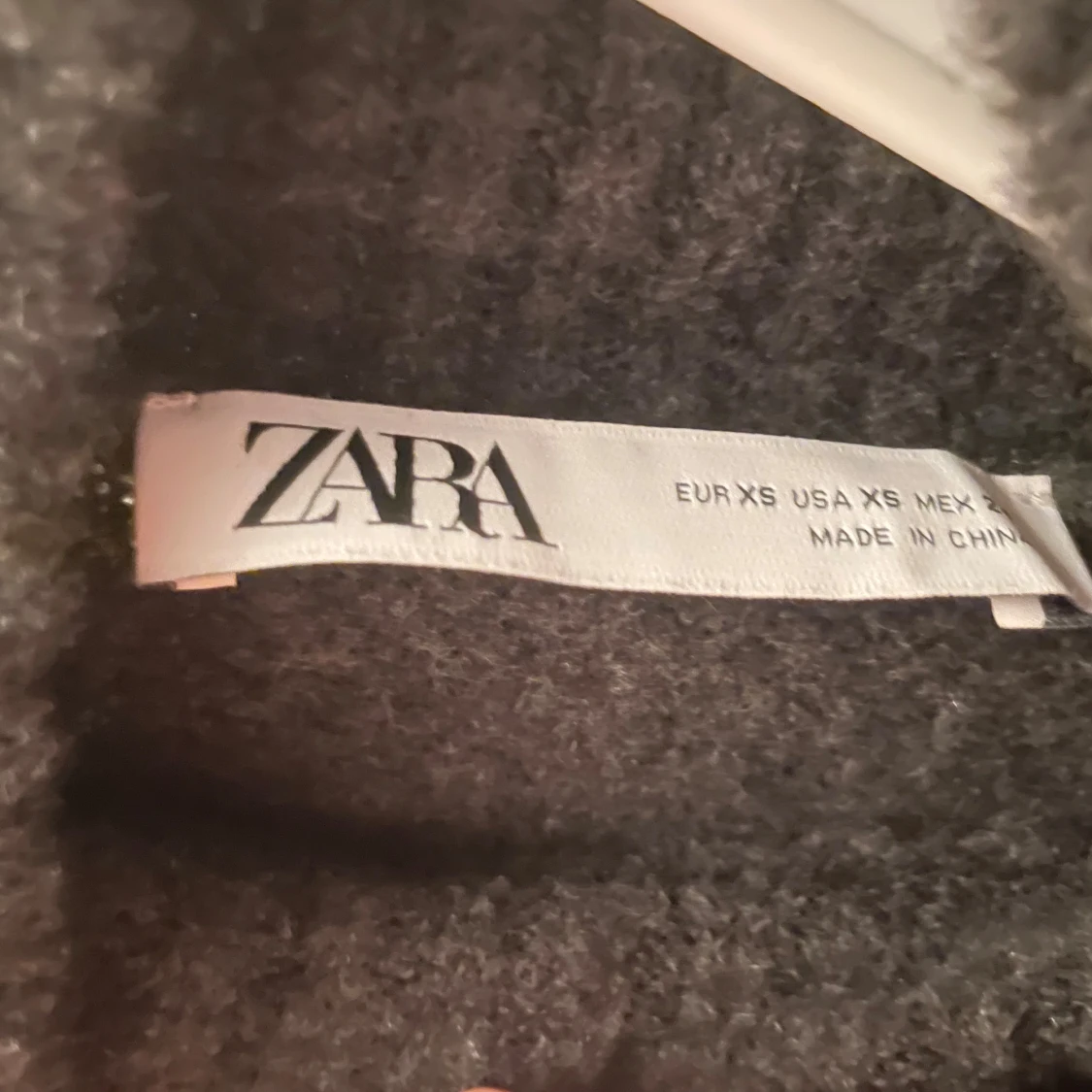 Grå polotröja från Zara XS