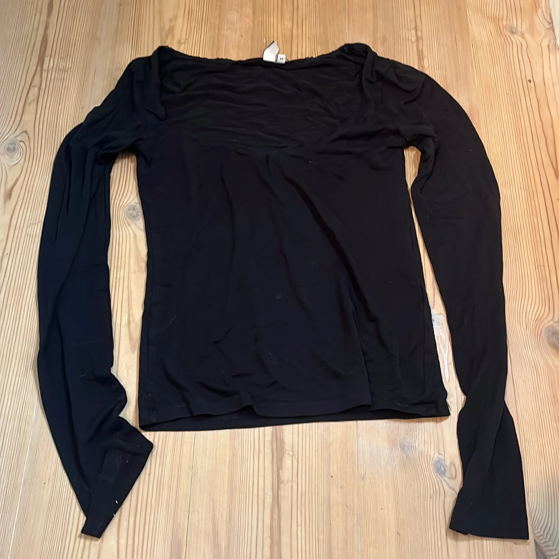 Svart långärmad topp från Nelly XS