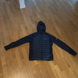 peak performance jacka - marinblå