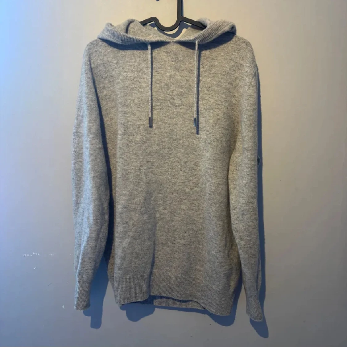 Grå merinoull hoodie