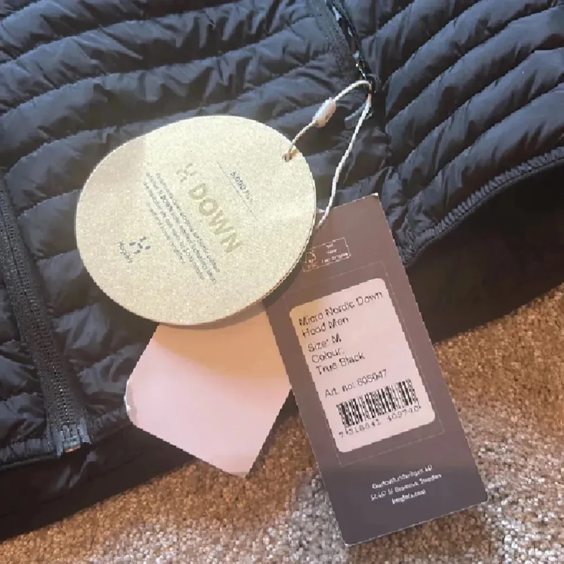 Svart dunjacka med huva från Haglöfs - 3