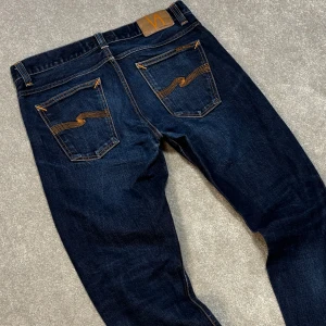 Nudie Dry Selvage Jeans - Nudie Jeans | Modell: Lean Dean, dry selvage | Skick 9/10, Väldigt bra | Nypris ca 3500kr | Mitt pris 899kr | Midjebredd: 43cm Ytterbenslängd: 103cm | Kom gärna pm vid frågor eller funderingar | Postas eller möts upp i Gävle!