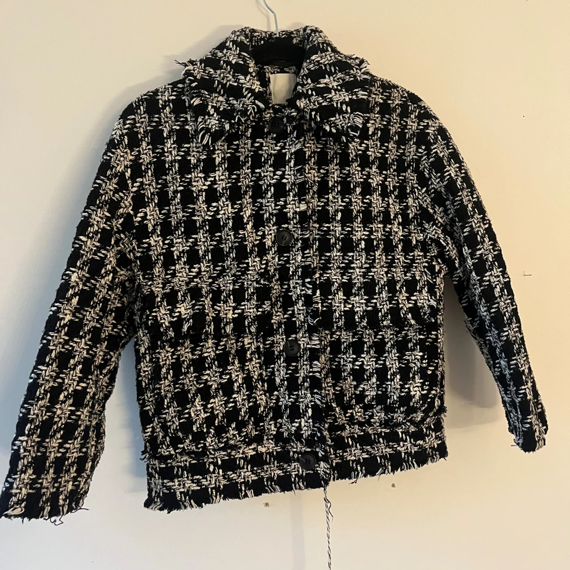 Svartvit rutig jacka