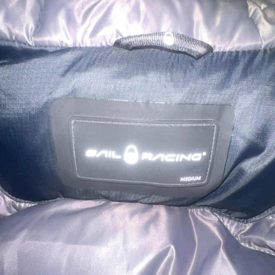 Svart pufferjacka från Sail Racing - 2