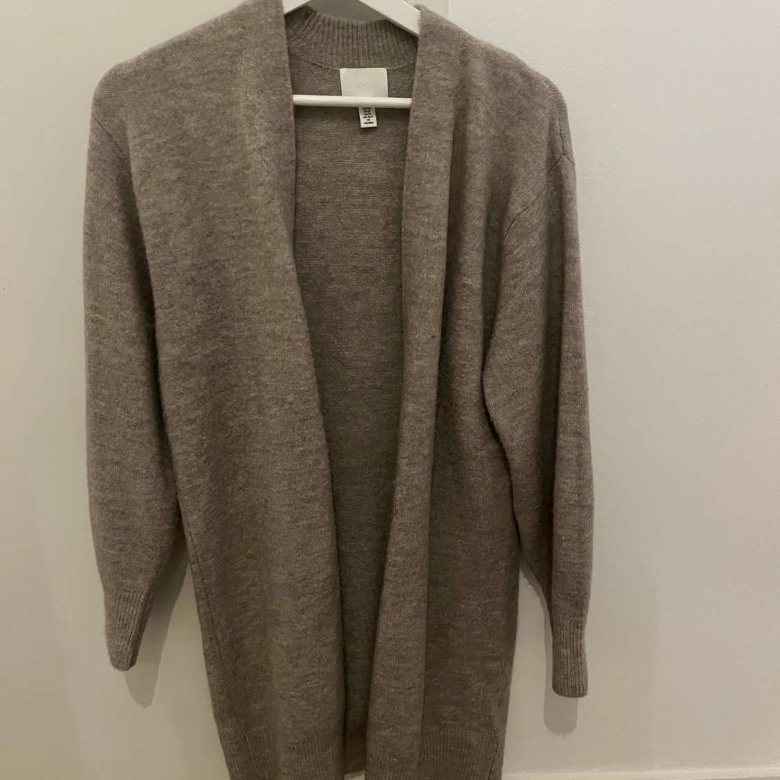 Beige lång kofta från H&M XS
