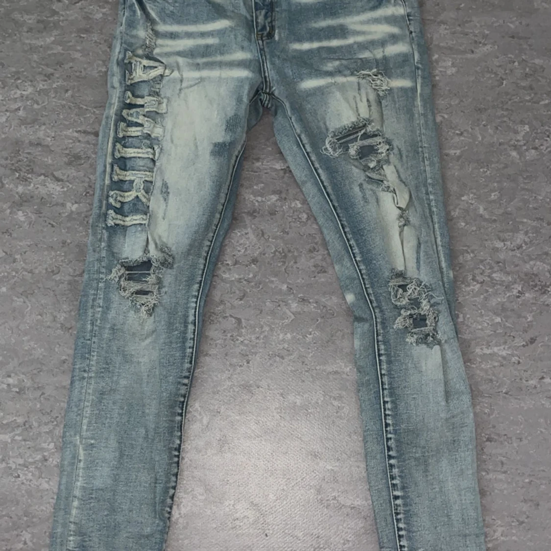 Ljus blåa amiri jeans 