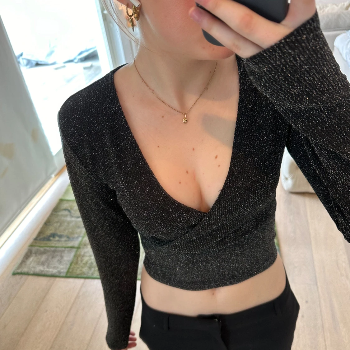 Svart glittrig topp 