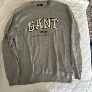 Gant tröja grå  - Gant tröja realtiv oanvänd 