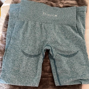 Relode tights - Grönspräckliga tights från Relode, nästan helt oanvända. 