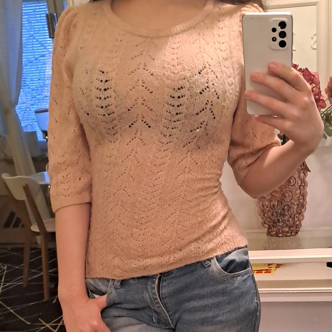 Stickad rosa tröja, sthlmstil