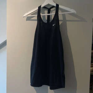 Nike cotton tank - Never worn! Bought recently but just haven’t used it…