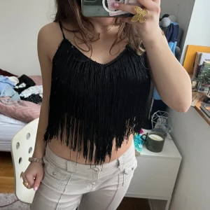 Svart franstopp - Svart franstopp från zara. Perfekt till sommaren eller temafest 