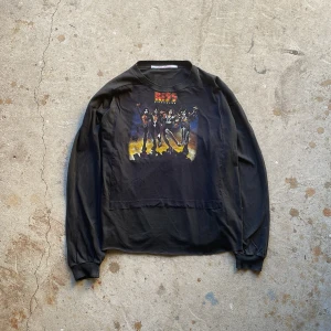 Oversized Longsleeve - Made from different longsleeves, this piece showcases a cropped oversized fit with distressed details