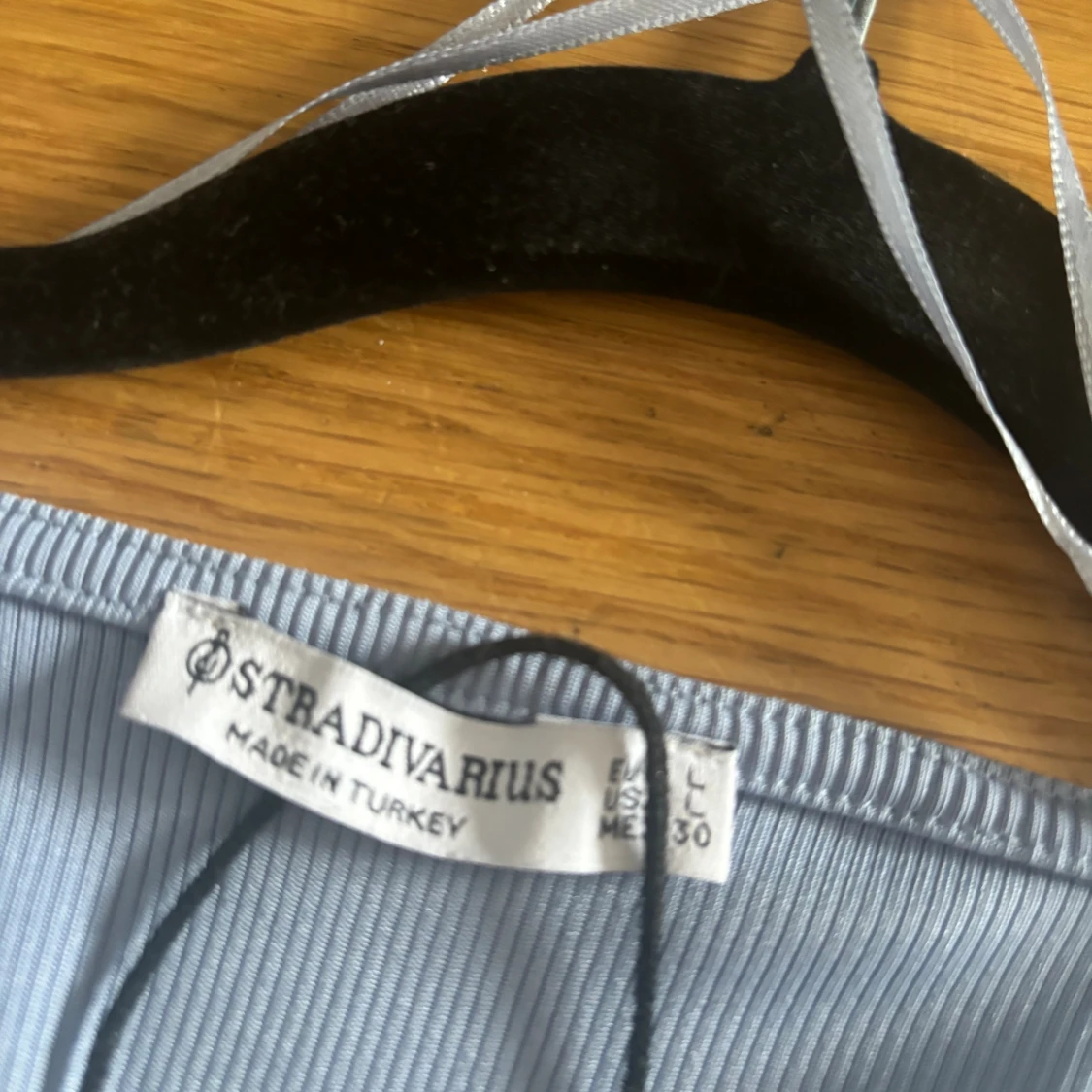 Ljusblå tröja - 91