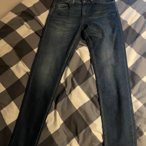 Tigerofsweden jeans helt nya  - Tiger of Sweden evolve helt nya med tags kvar. Storlek 31x34 Säljer för att de inte passade.