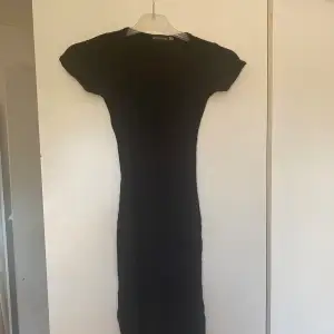 Svart kort klänning 