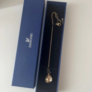 Swarovski necklace - Gold necklace from swarovski. New necklace. Not used. 