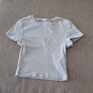 Top - Grey cute xs crop top.  Used few times but not anymore.