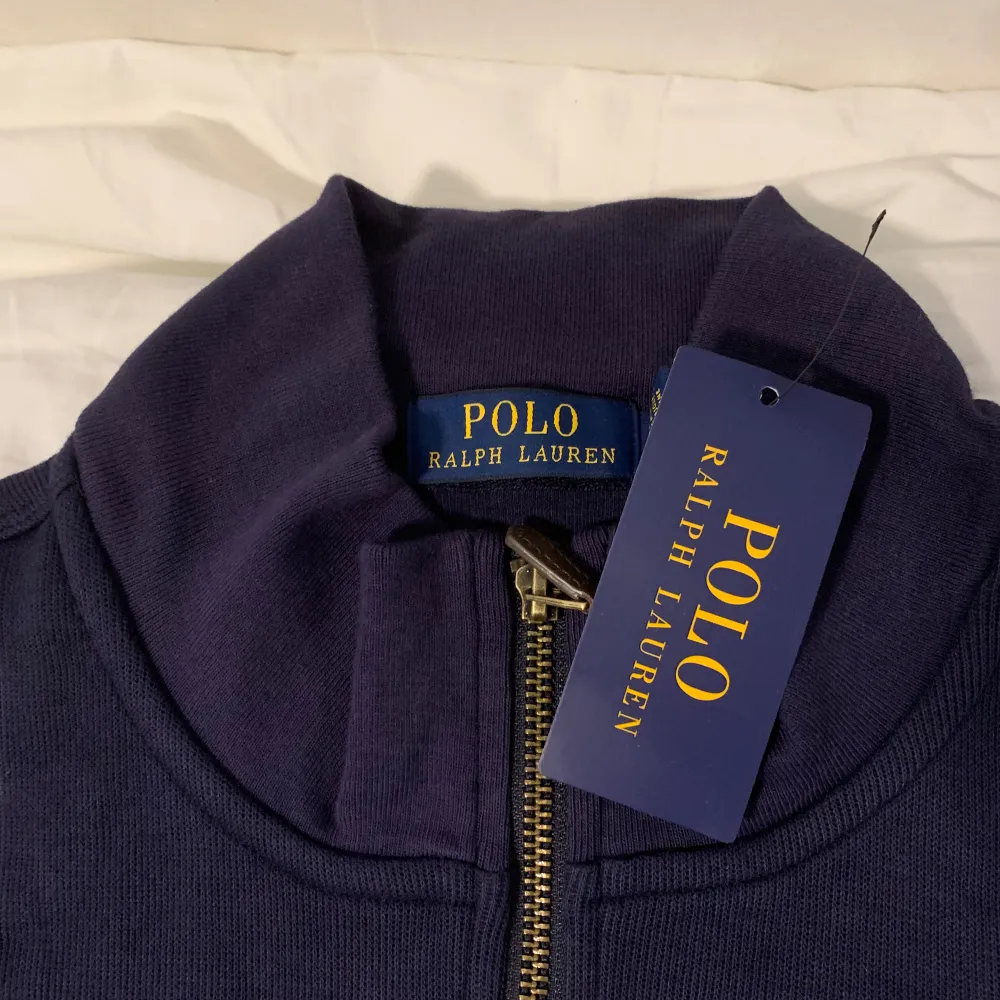 Color: Navy blue Size: L works if you are XL too (little bit big) Care label: Not recommended to machine wash if, (hand wash it). The material is really sensitive.  Comes with tags and the bag (Polo ralph lauren). Hoodies.