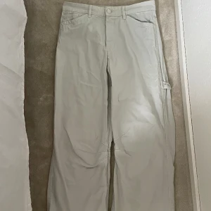 Cargojeans  - Cargojeans i stolek 38. Ljusgröna/mintgröna.