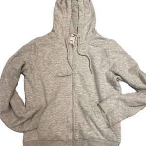 Grå ziphoodie - Grå ziphoodie från NewYorker.  Använd några gånger