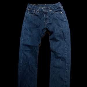 Dark blue Levi’s 501 jeans, never worn