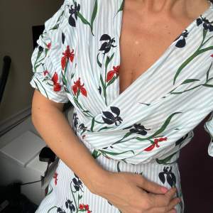 Floral summer dress. Never worn it. Bought in a sample sale in Stockholm 