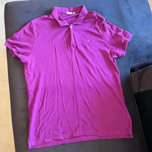 JLindeberg storlek L  - Lila JL pike, endast prövad piké.