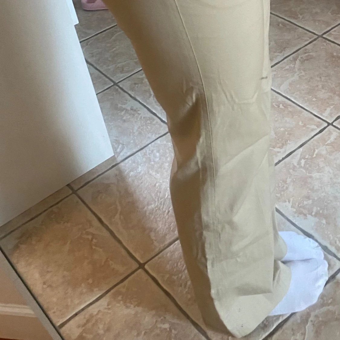 Beige byxa/ med vit spets