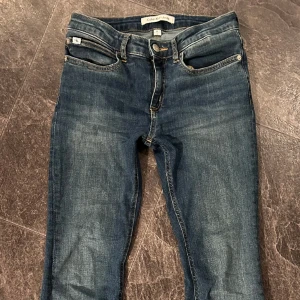 Calvin Klein jeans str 14 - Lite använda! Low waist  Bootcut Stretch Storlek 14