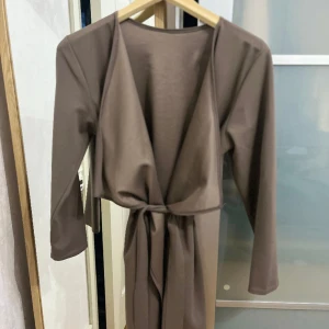 Kappa - Tunn och skön kappa perfekt till sommaren som ger en snygg lock