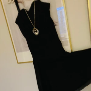 Black dress  - Great for any occasion! Elegant or casual, make it the perfect dress you need with the right accessories/shoes! Extra small, but fits even small/medium! Adjustable braces for any breast size from xs to medium!