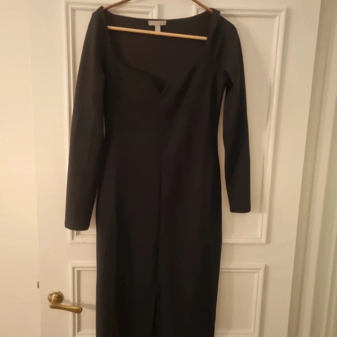 Svart långärmad klänning