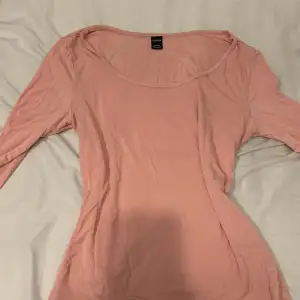 Rosa long sleeve använd en gång. 