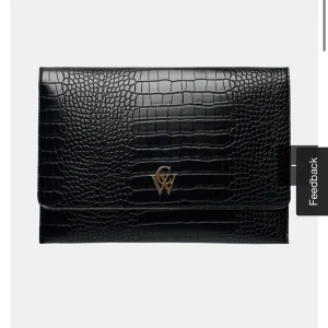 Datorfodral - Skriv om egna bilder på fodralet önskas.