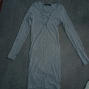 Tajt klänning  - Nästan hwlt oanvänd