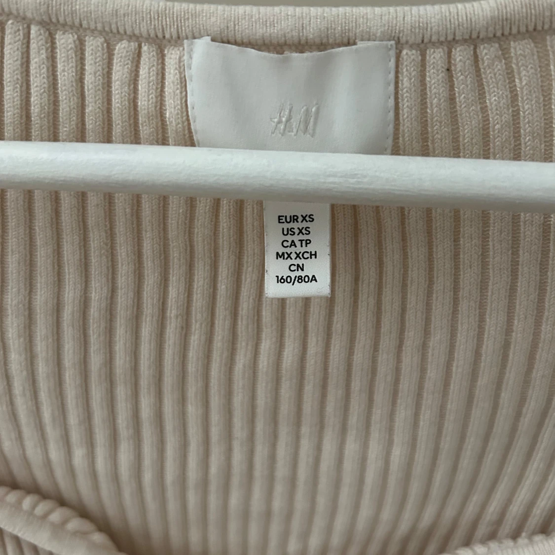 Ribbstickad tröja - 90