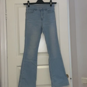 Ljus blåa jeans bootcut  - S/xs