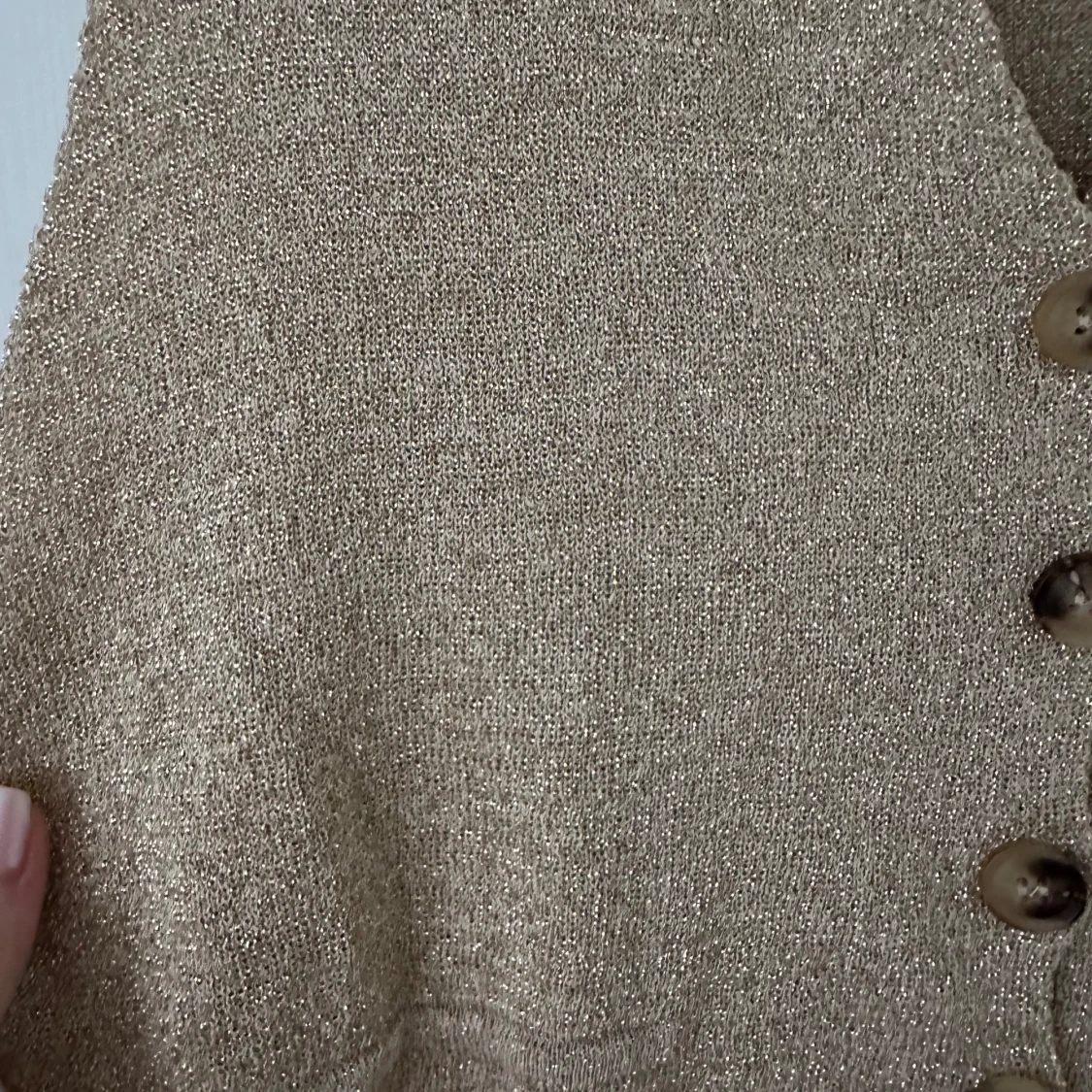 Glittrig väst  - 91