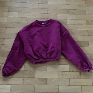 Lila rosa croppad tröja